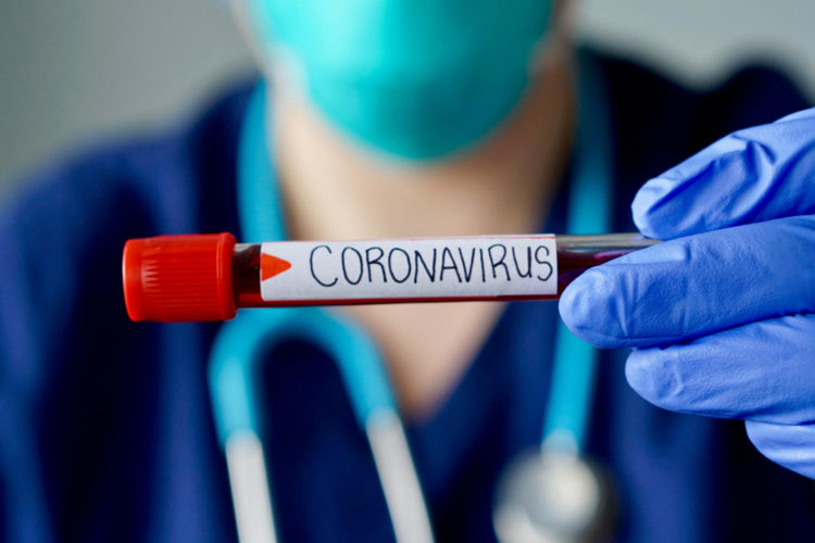 Coronavirus written on a test tube